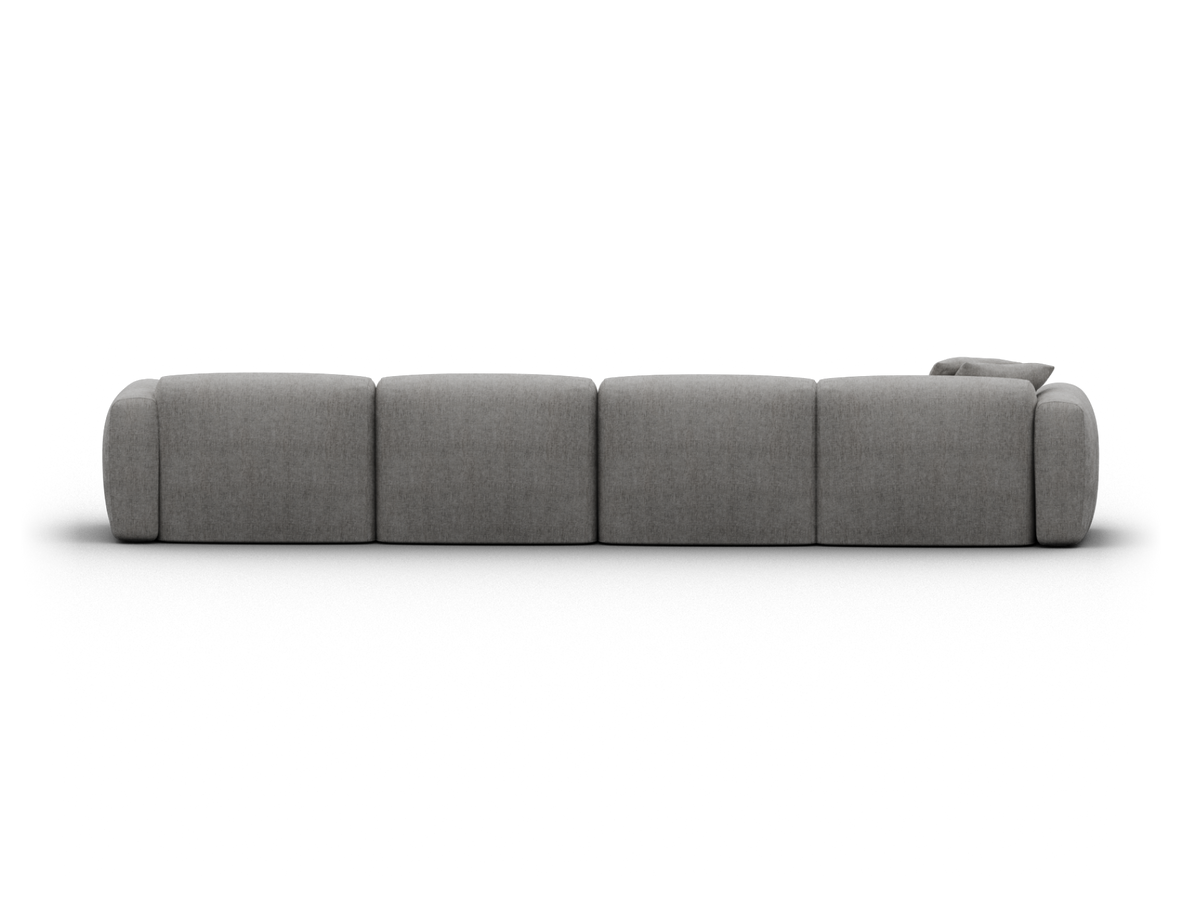 Luxurious modular grey fabric sofa, featuring a low-profile design with plush seating; ideal for chic, contemporary living spaces.