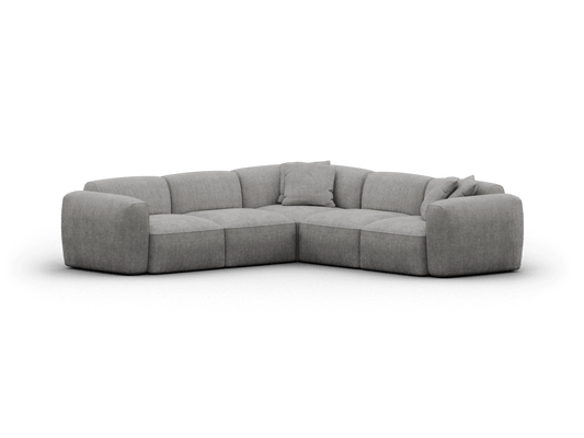 Grey fabric corner sofa with plush cushions, featuring blocky armrests and a modular design. Perfect for a contemporary living room setting.