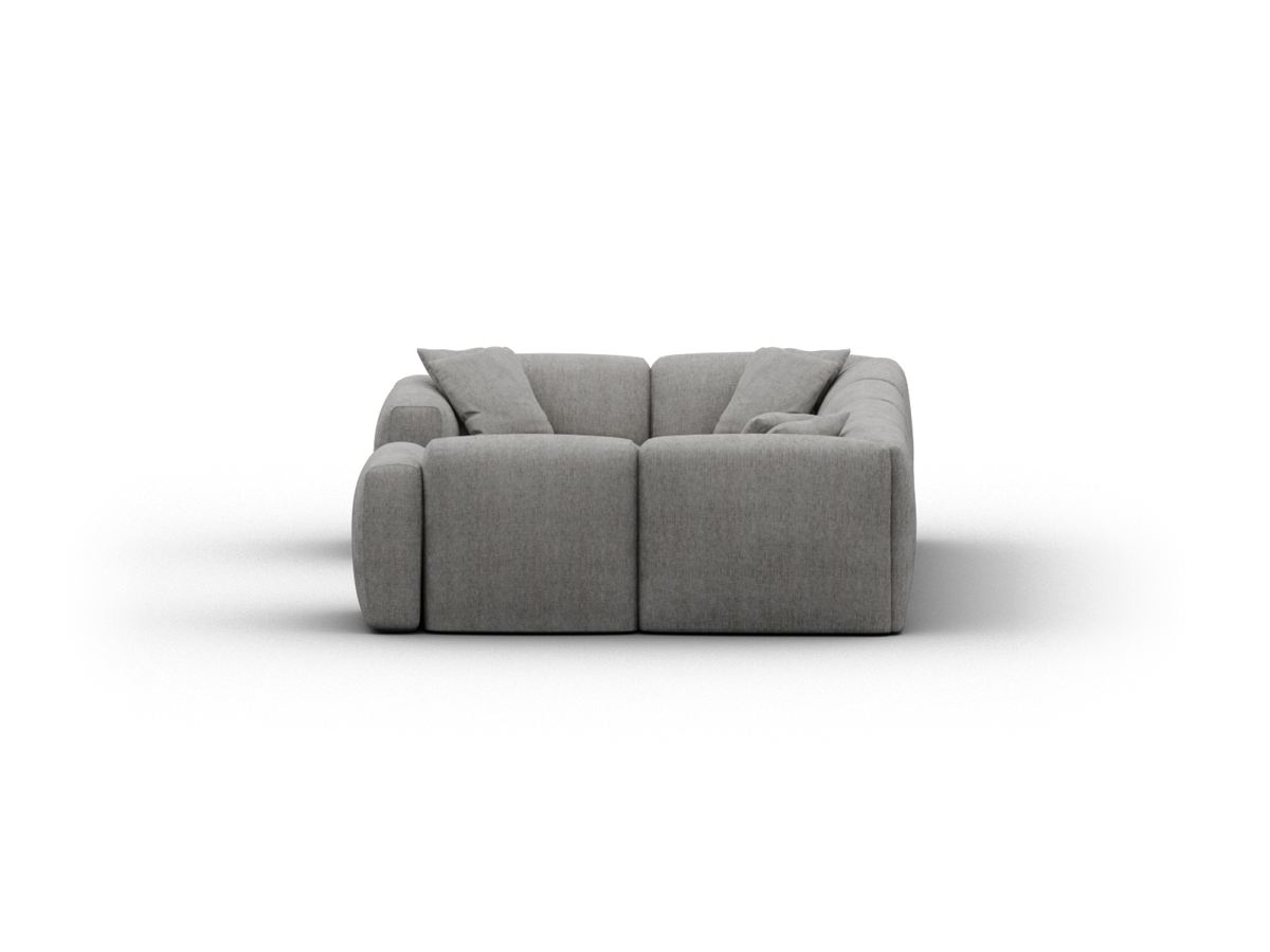 Luxurious grey fabric sofa featuring plush cushions and a minimalist design. Perfect for contemporary living spaces seeking modern elegance.