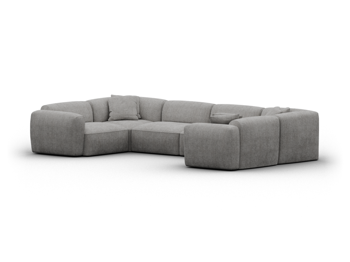 Luxurious grey fabric sectional sofa with deep seating and plush cushions. Features modern design and inviting comfort, perfect for sophisticated living rooms.