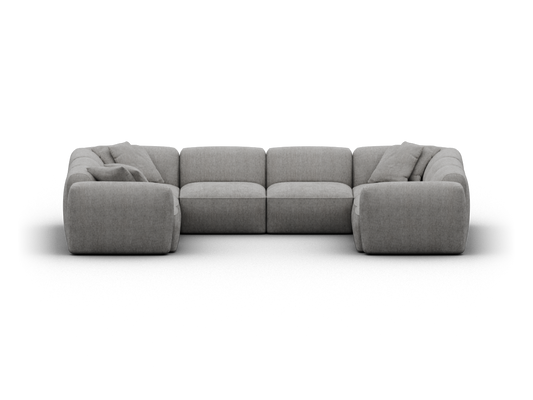 Luxurious grey fabric modular sofa with deep seats and plush back cushions, offering comfort and versatility in a sophisticated contemporary setting.