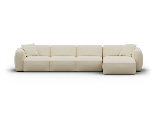 Cream modular sectional sofa with plush cushions and sleek upholstery. Features deep seats and clean lines, perfect for a contemporary living room setting.