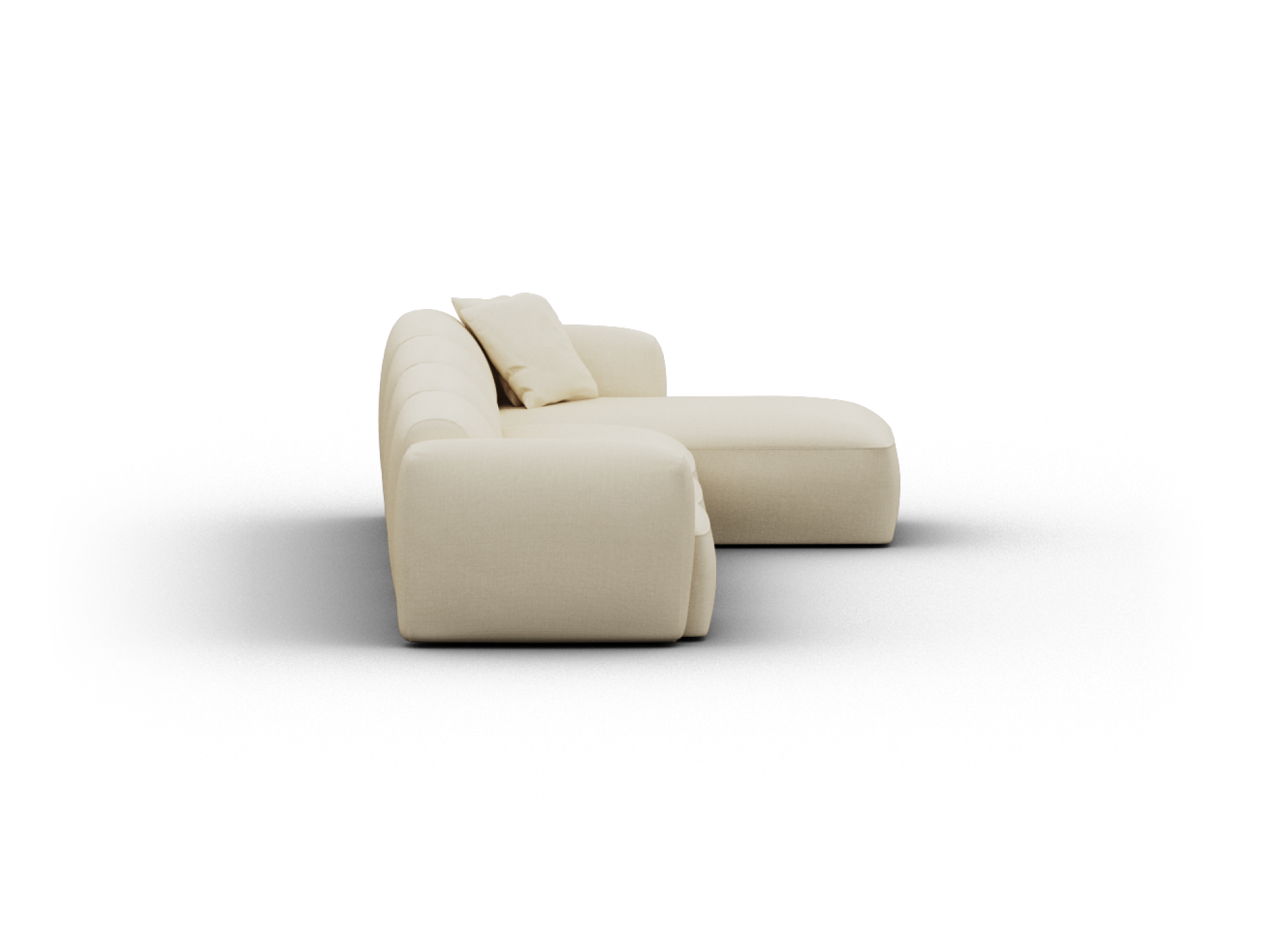 Luxurious beige fabric sofa with plush cushions, modern design, and curved lines, offering comfort and style in a contemporary living space.