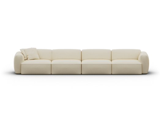 Cream-coloured modular sofa with plush cushions, upholstered in premium fabric. Features a minimalist design ideal for luxury living rooms.