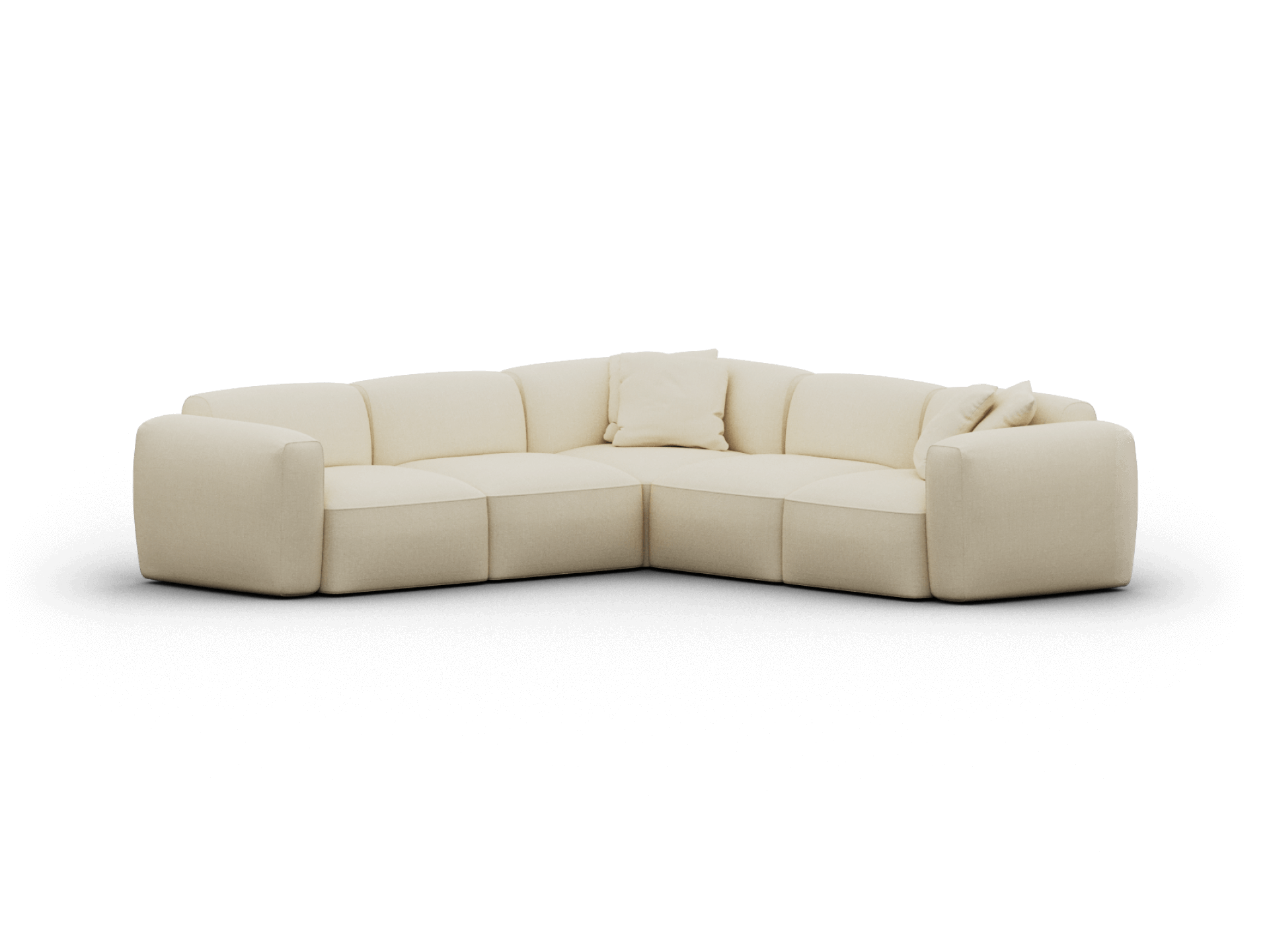 Luxurious cream modular sofa in plush fabric, featuring soft, rounded edges and generous cushions, set in a contemporary living space.