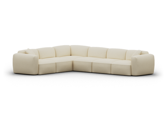 Luxury sectional sofa in creamy beige fabric, featuring plush cushions and contemporary lines. Modular design perfect for upscale living spaces.