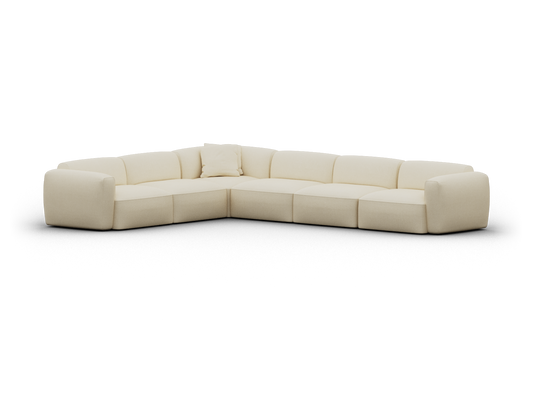 Luxurious L-shaped sectional sofa, upholstered in plush cream fabric with deep cushioned seats; perfect for modern, elegant living spaces.