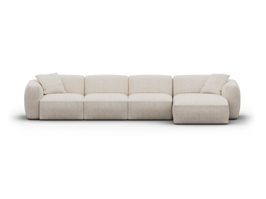 Luxurious modular sofa with beige upholstery, plush cushions, and streamlined design, enhancing a modern living space with effortless elegance.