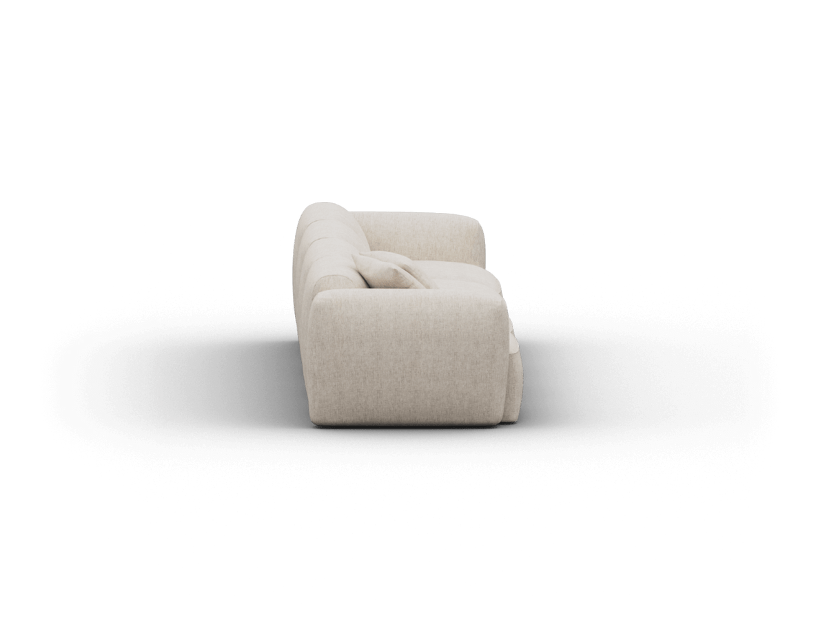 Luxurious cream fabric sofa with plush cushioning, showcasing a sleek, modern silhouette. Ideal for elegant, contemporary living spaces.