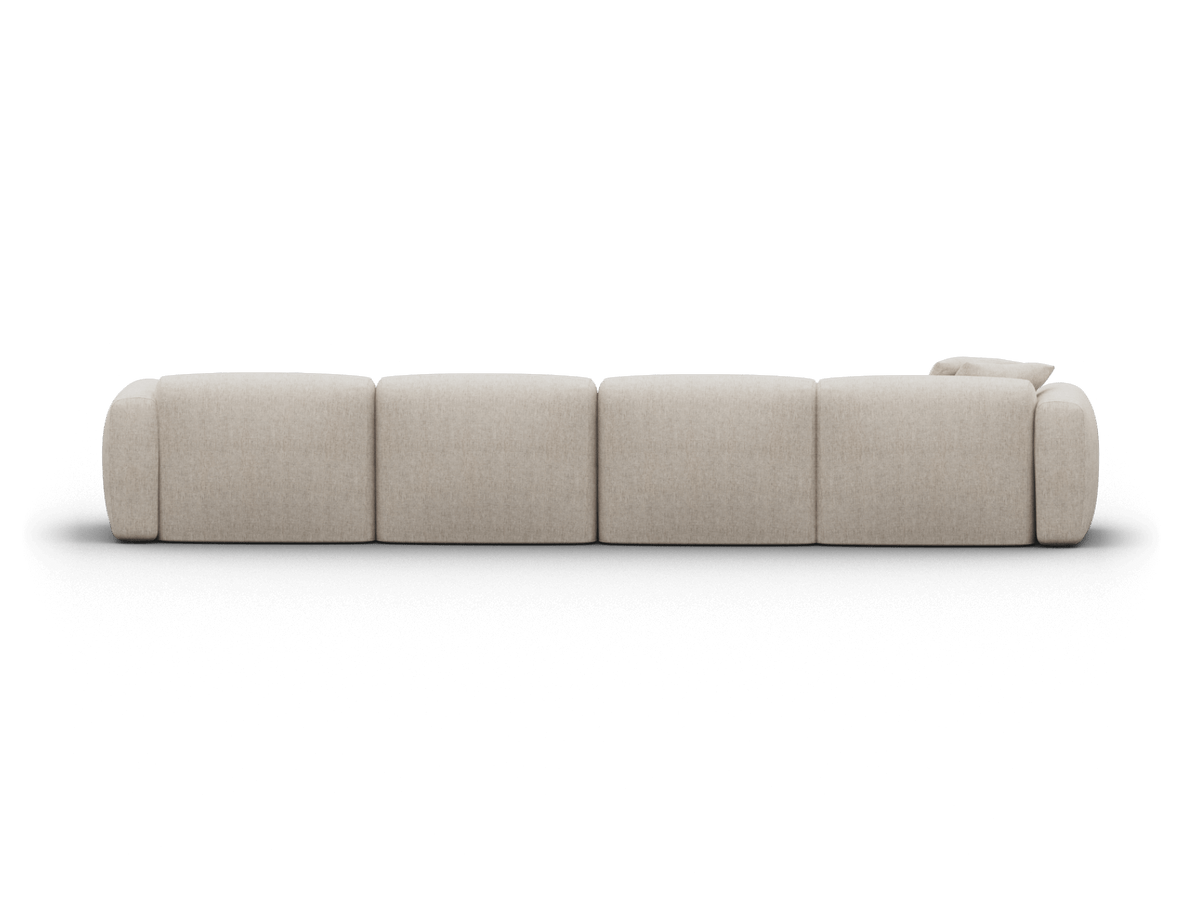 Luxurious modular sofa in soft beige upholstery, featuring plush cushions and clean lines. Ideal for a sophisticated contemporary living space.