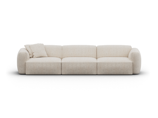 Luxurious beige fabric sectional sofa with plush cushions and rounded arms, set in a minimalist living room. Crafted for premium comfort and style.