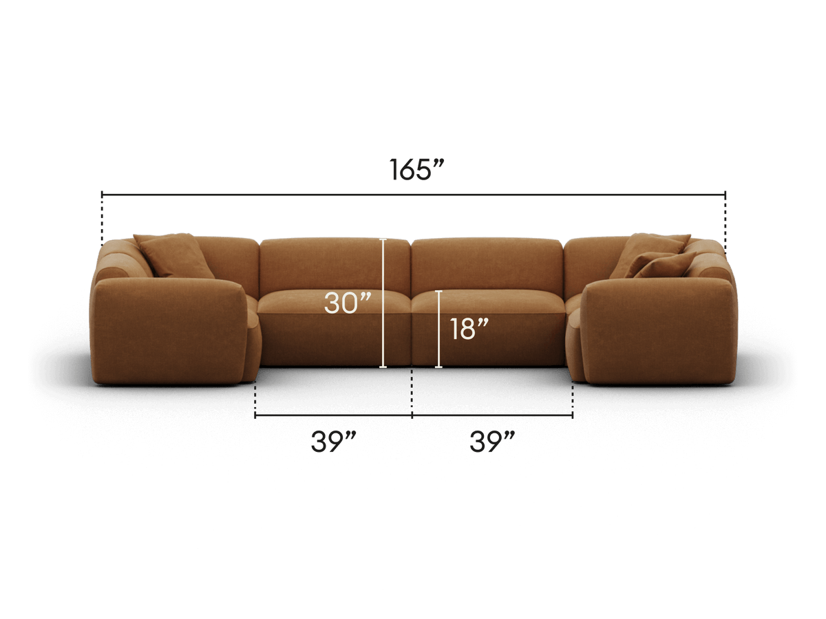 Luxurious L-shaped sectional sofa in rich tan fabric, featuring plush cushions and deep seats. Ideal centrepiece for a sophisticated living room setting.