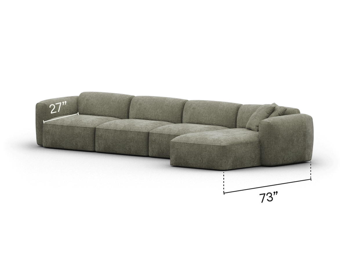 Luxurious modular sectional sofa in plush olive green upholstery. Features deep seats, clean lines, and chaise lounge, ideal for a contemporary living space.