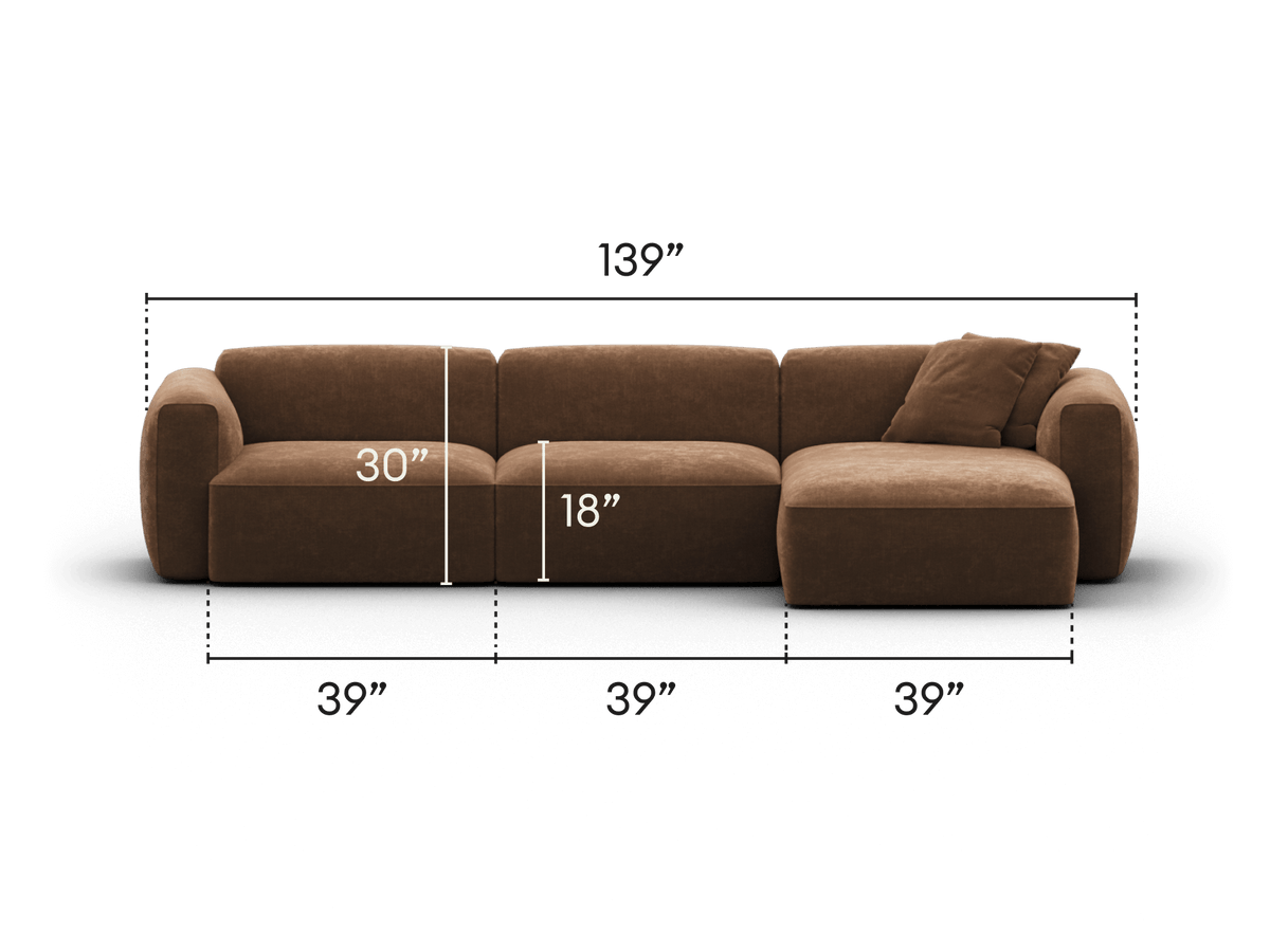 Luxurious modular sofa in rich brown velvet, featuring plush, rounded cushions and an integrated chaise. Perfect for a sophisticated living room setting.
