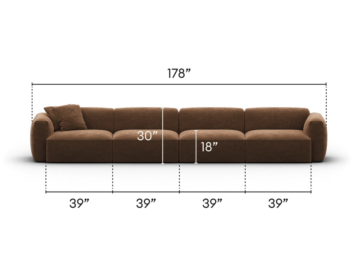 Luxurious modular sofa in rich brown velvet, featuring a low profile, plush cushioning, and versatile sections. Ideal for sophisticated living spaces.