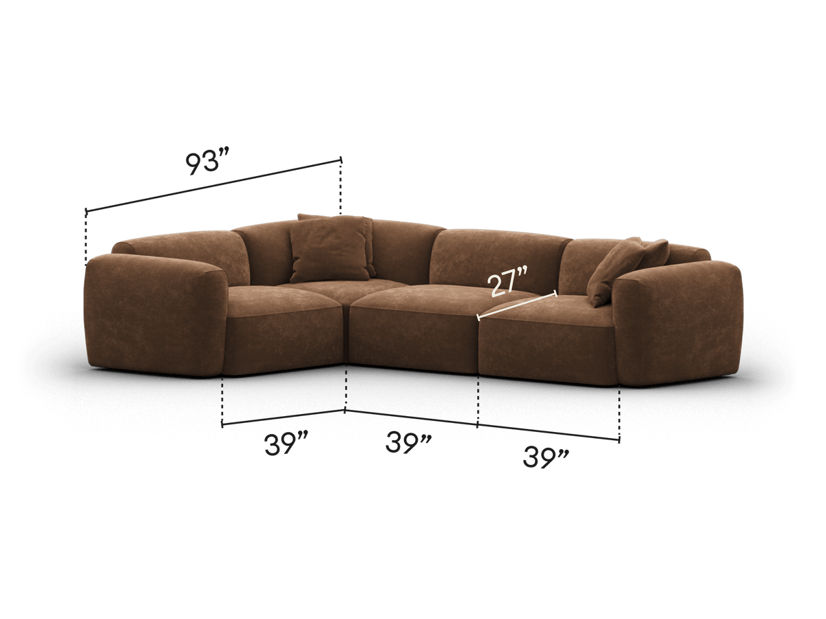 Luxurious brown suede sectional sofa with deep, plush cushioning and modular design. Features rounded edges, perfect for modern living spaces.