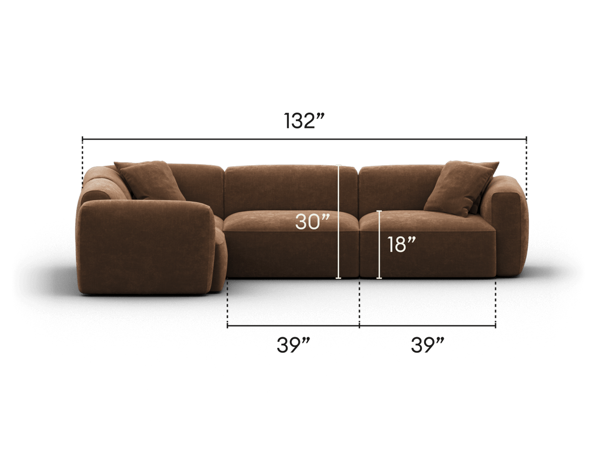 Luxurious brown velvet sectional sofa, featuring plush cushions and spacious seating. Ideal for modern living spaces, offering comfort and sophisticated style.