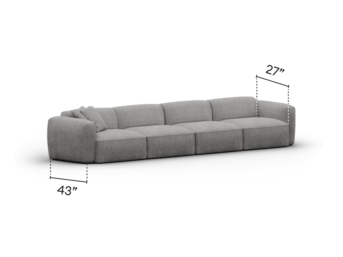 Luxurious modular sofa in soft grey fabric, featuring deep cushions and low-profile design. Perfect for spacious modern living areas, measuring 48" x 27".