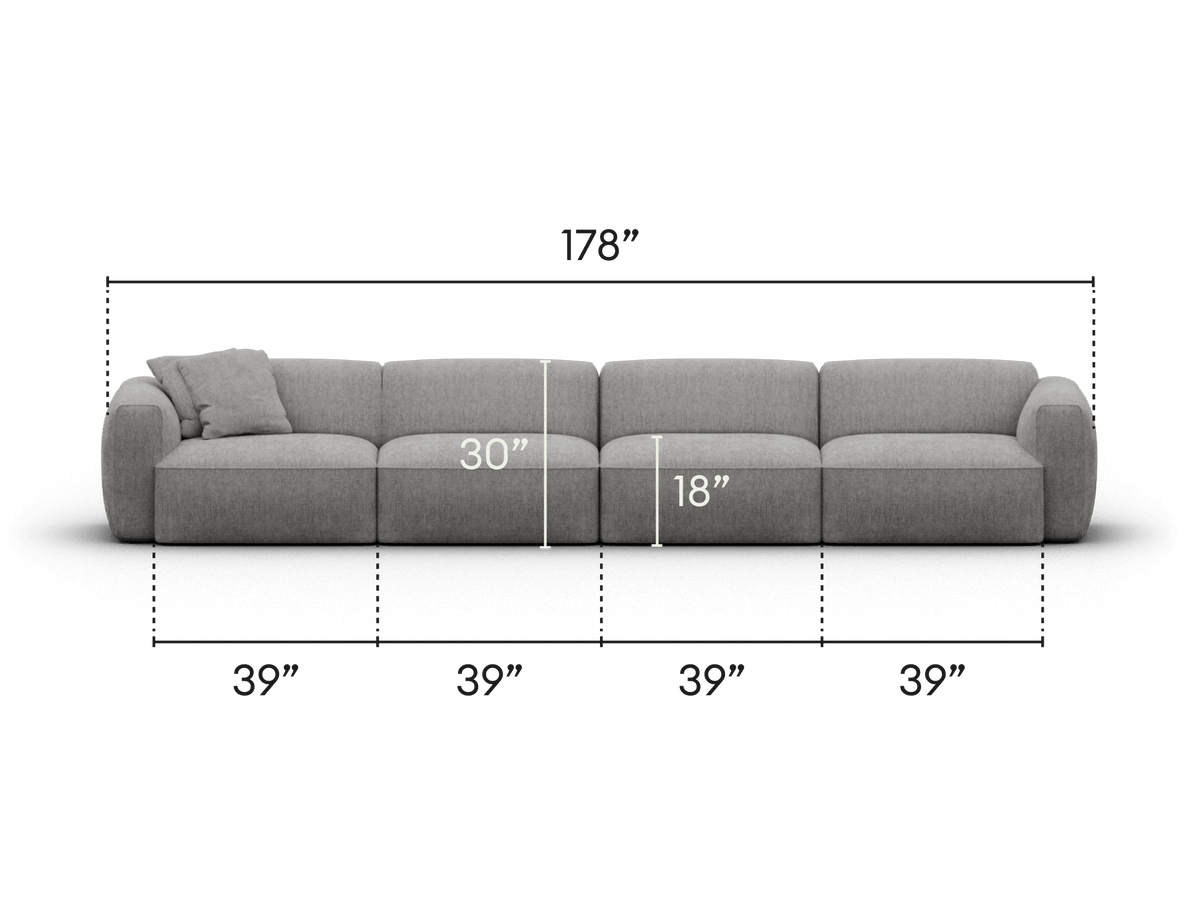 Luxurious three-seat grey modular sofa in premium fabric, featuring plush cushioning and rounded arms. Perfect for elegant, contemporary living spaces.