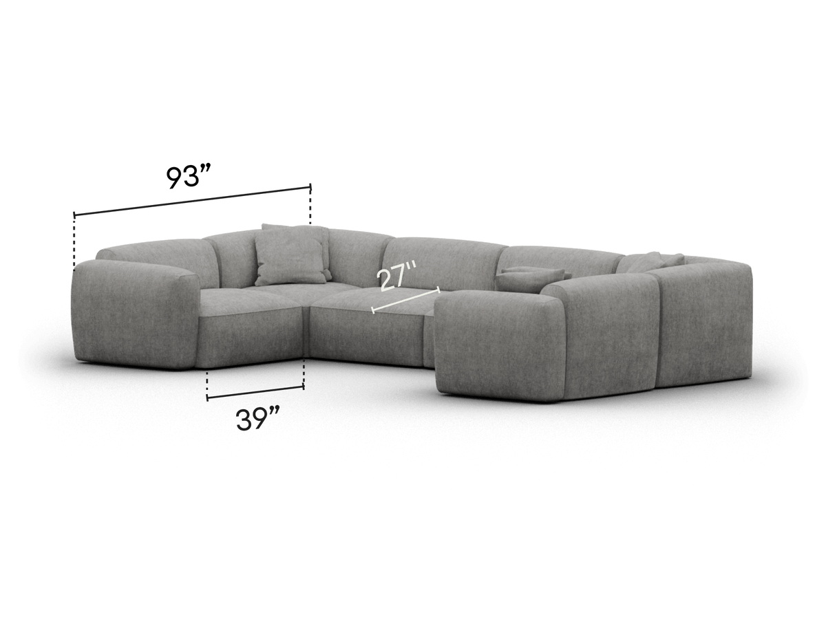 Premium grey sectional sofa, upholstered in plush fabric. Features deep seats, modular design, and a sleek silhouette. Perfect for a contemporary living room.