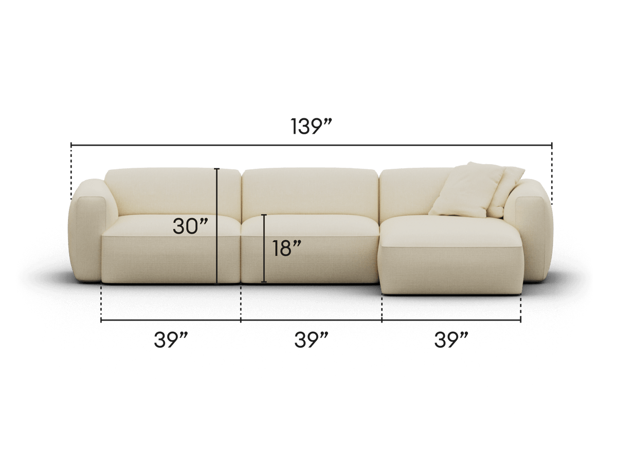 Luxurious modern sectional sofa in creamy white fabric, featuring plush cushions, sleek low-profile design, and modular structure; perfect for stylish living spaces.