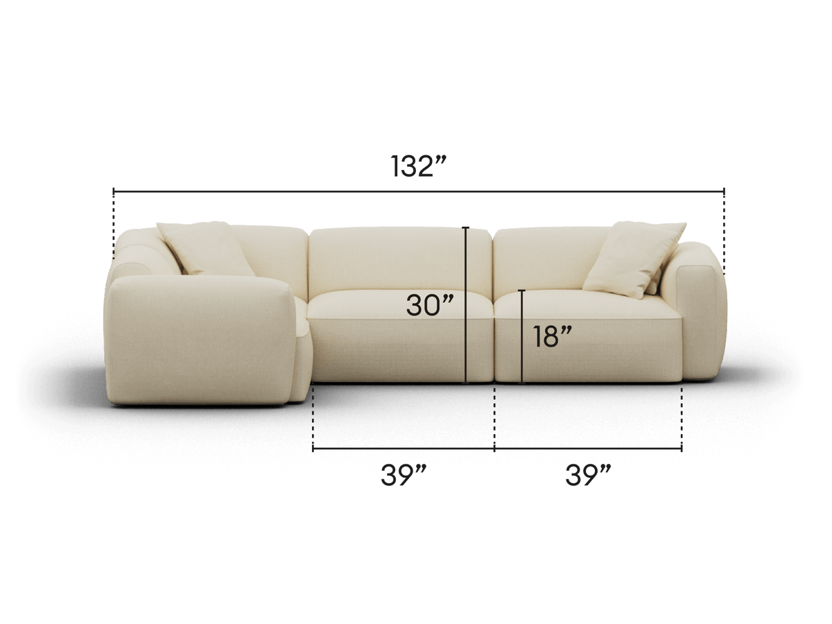 Luxurious beige sectional sofa, upholstered in premium fabric, featuring plush cushions and a modular design. Perfect for a sophisticated living space.