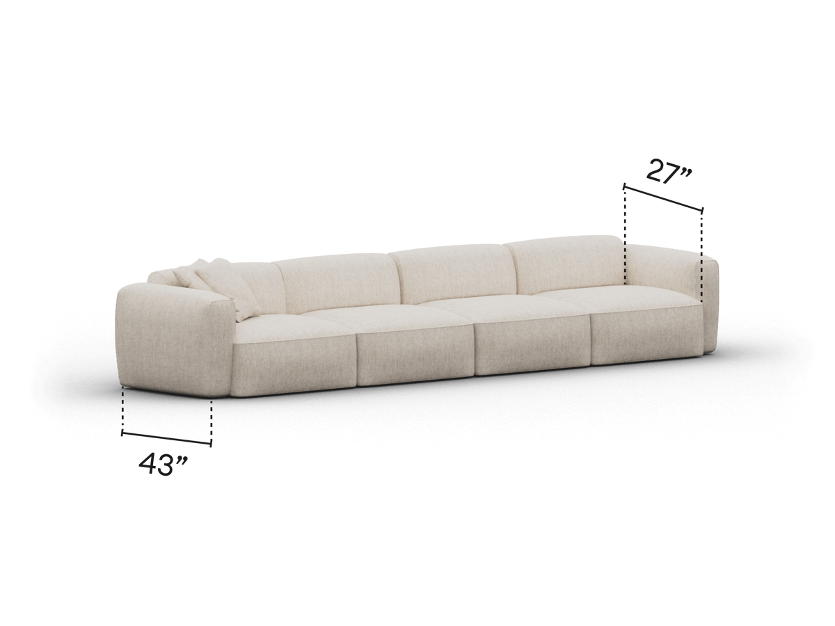 Luxurious beige sectional sofa in premium fabric, featuring plush cushions and a low-profile design. Ideal for modern living rooms, enhancing comfort and elegance.