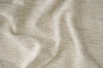 Luxurious cream chenille fabric with a soft, inviting texture, perfect for upholstery in modern living spaces seeking elegance and comfort.