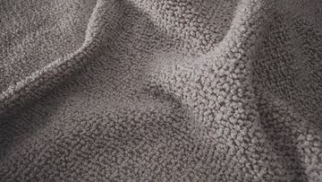 gray poodle material in light room