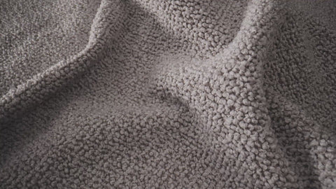 gray poodle material in light room
