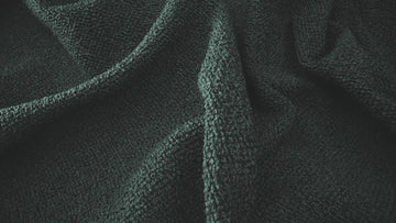 dark green premium fabric in sun light