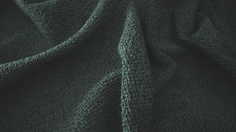 dark green premium fabric in sun light