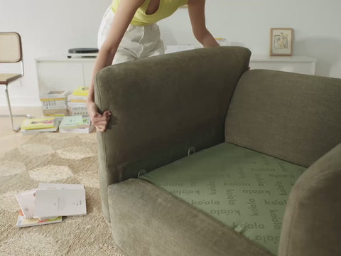 woman assembling a modular sofa